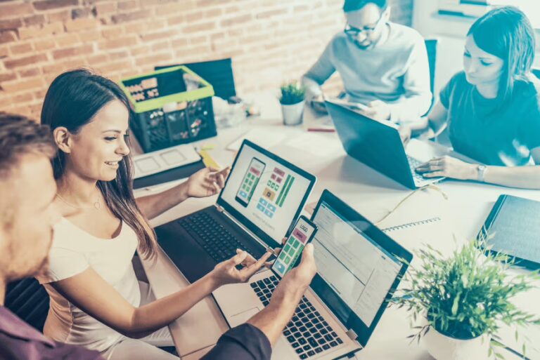 10 Must-Know User Experience Design Tips for Better Products (blog featured image - a team of UX designers)
